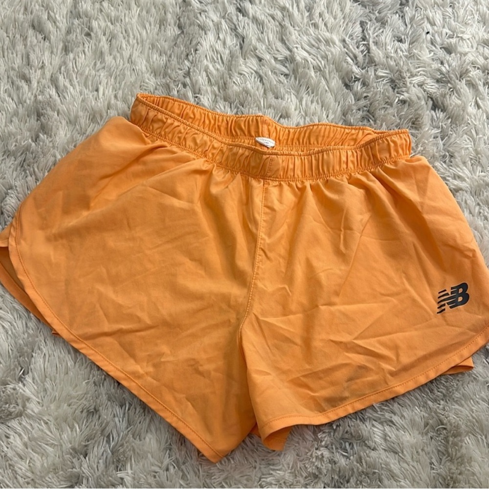 New Balance Women's Vibrant Orange Athletic Shorts